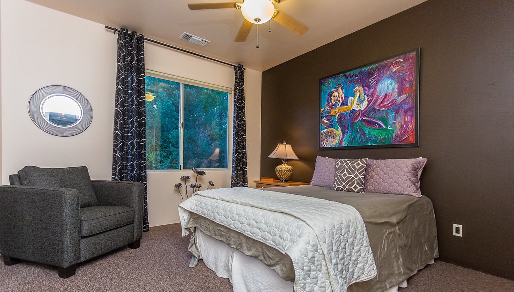 Queen guest bedroom with private courtyard access